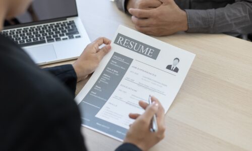 Employer or HR department is reading the resume and interviewing the ability of new employees, Employer is selecting job applicants, Employment and Recruitment Concept.