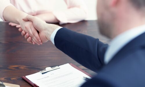 Woman getting a job after successful interview