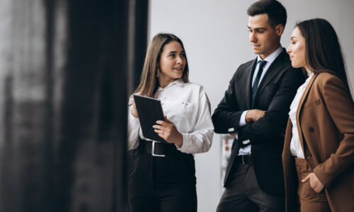 male-female-business-people-working-tablet-office